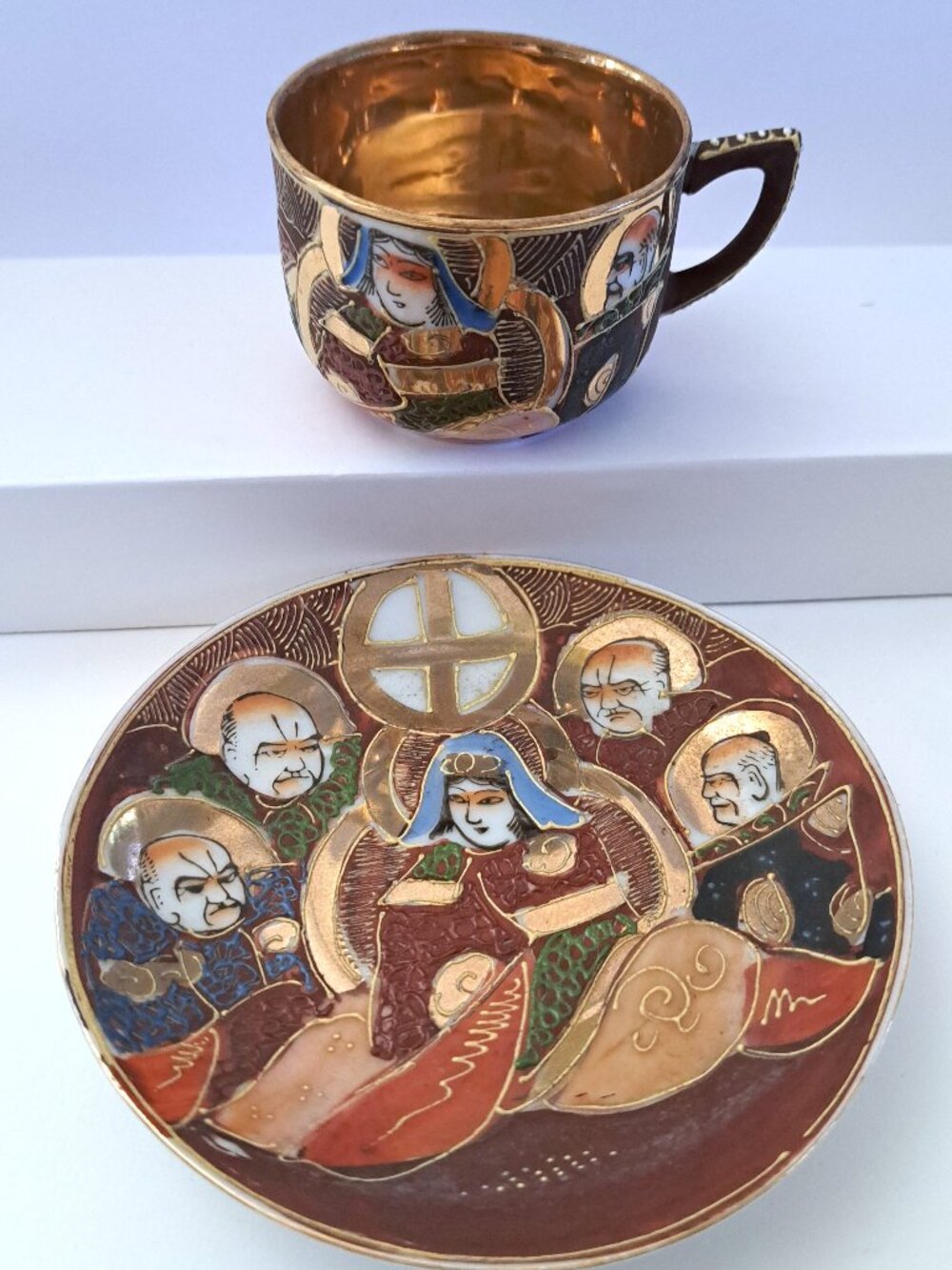 JAPAN SATSUMA TEACUP & SAUCER EMBOSSED GRAPHICS DEMITASSE SIZE HAND PAINTED